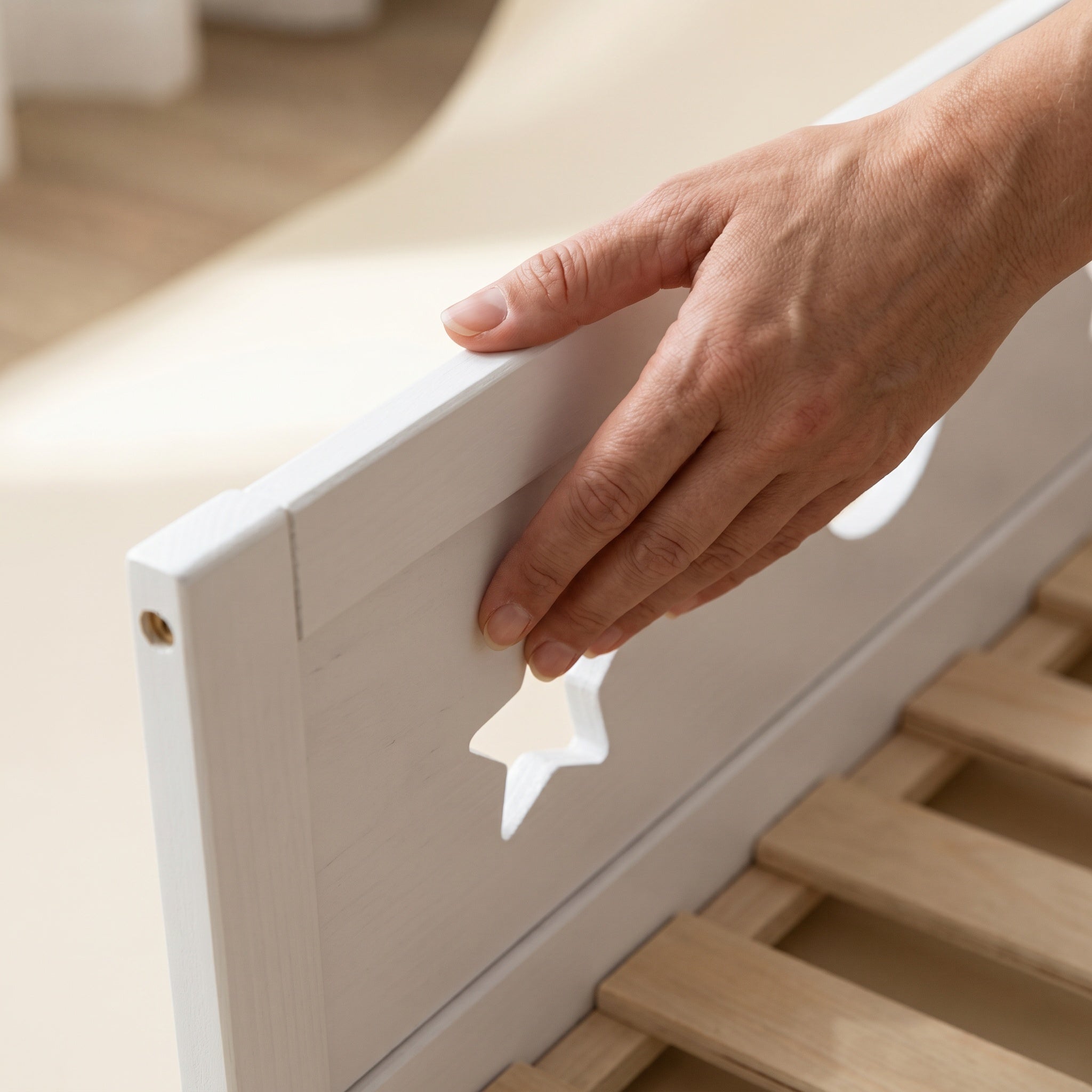 Montessori floor bed with moon and star motif