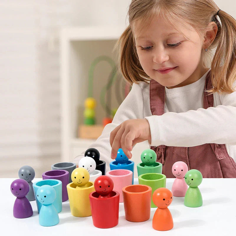 Montessori toys: dolls and colorful shapes