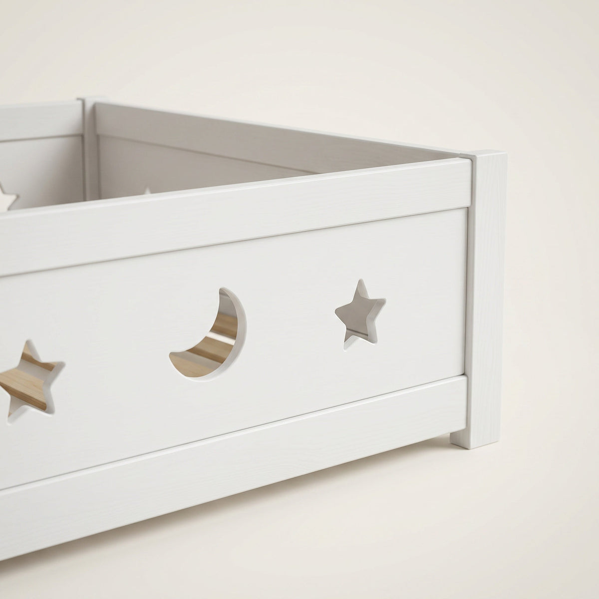 Montessori floor bed with moon and star motif