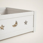 Montessori floor bed with moon and star motif