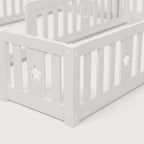 Montessori double bed for floor mounting with star-shaped side rails