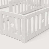 Montessori double bed for floor mounting with star-shaped side rails