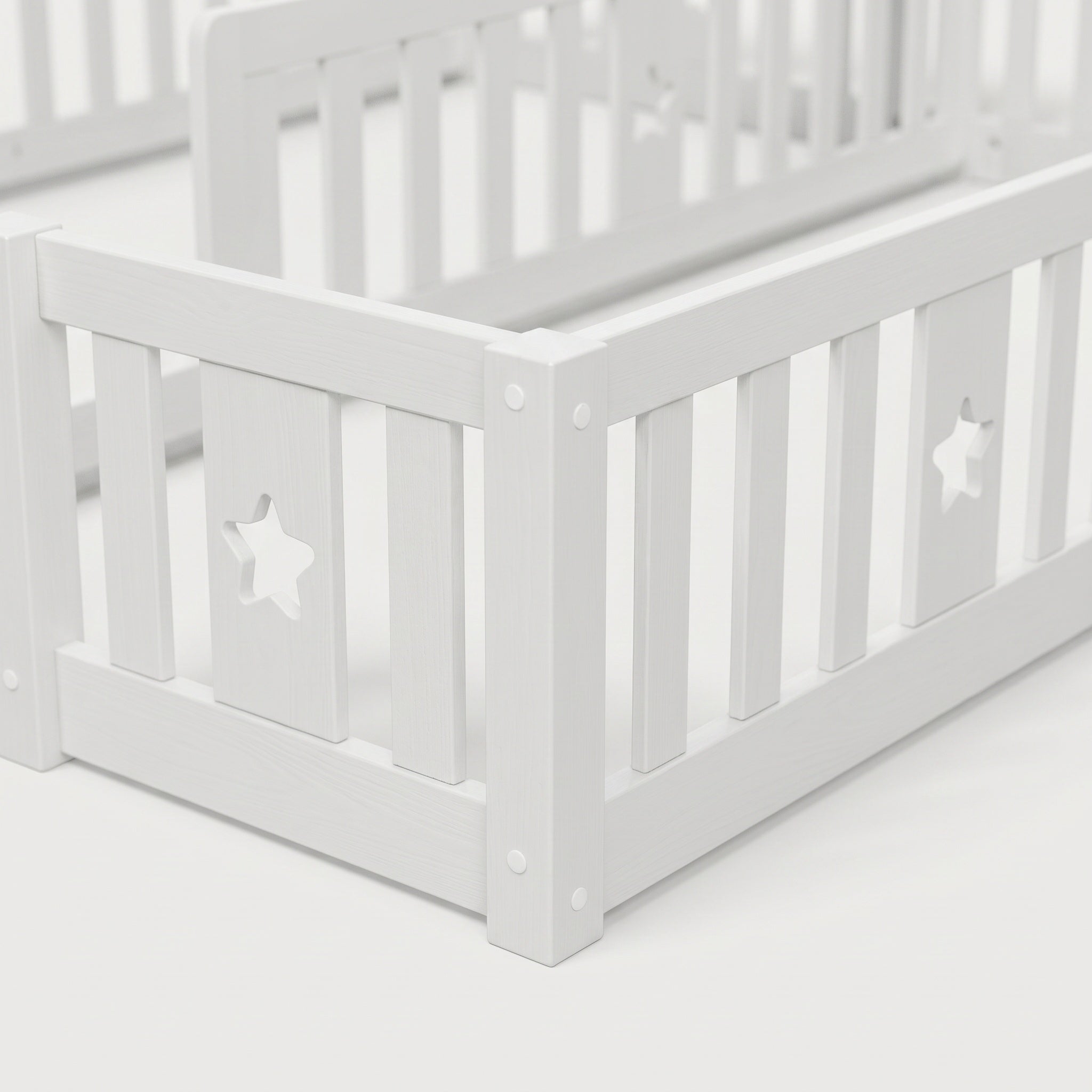 Montessori double bed for floor mounting with star-shaped side rails