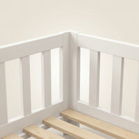 Montessori floor bed made of white solid wood