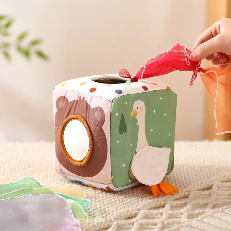 Montessori activity cube with sensory elements