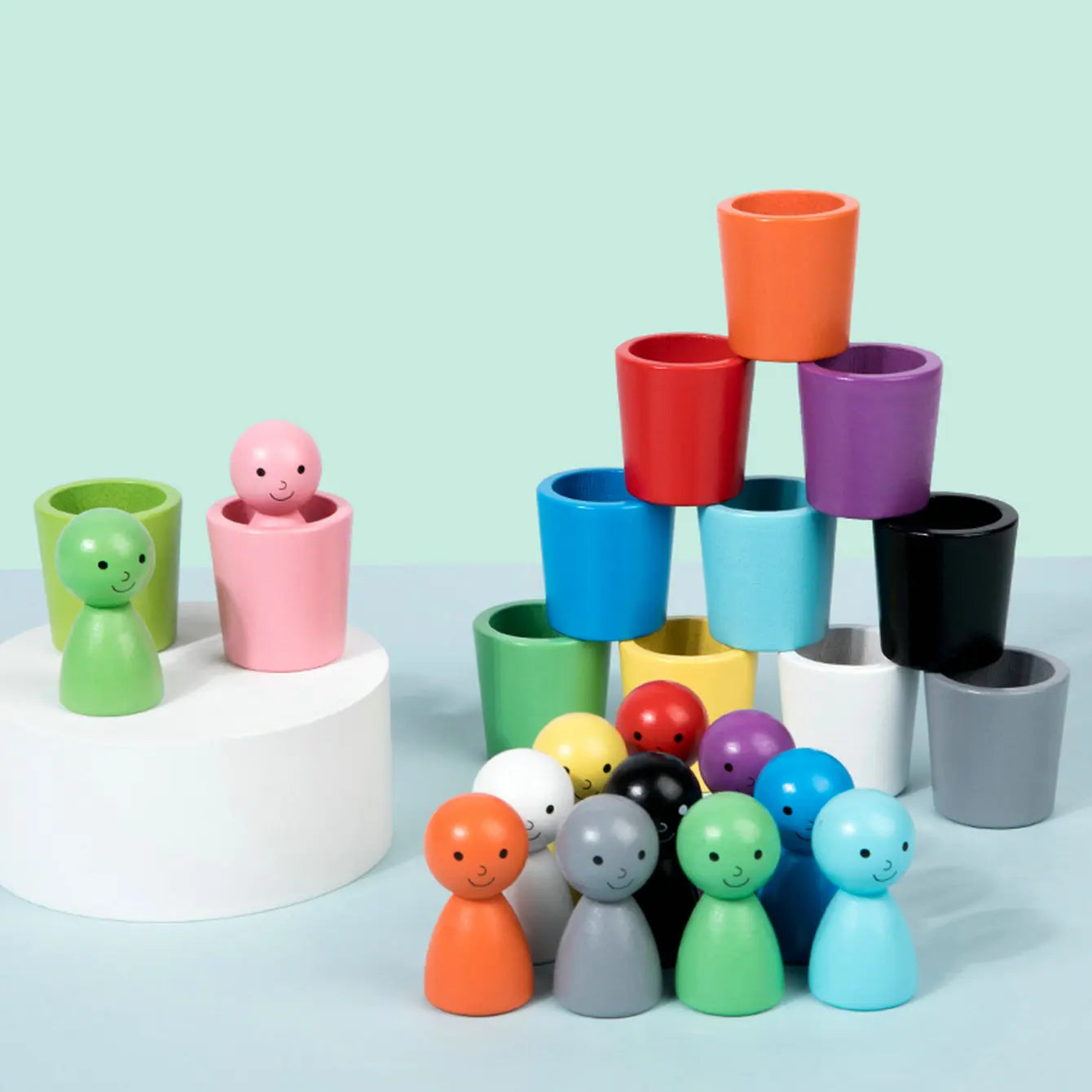 Montessori toys: dolls and colorful shapes