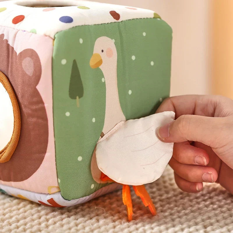 Montessori activity cube with sensory elements
