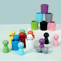 Montessori toys: dolls and colorful shapes