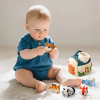 Montessori activity cube with sensory elements