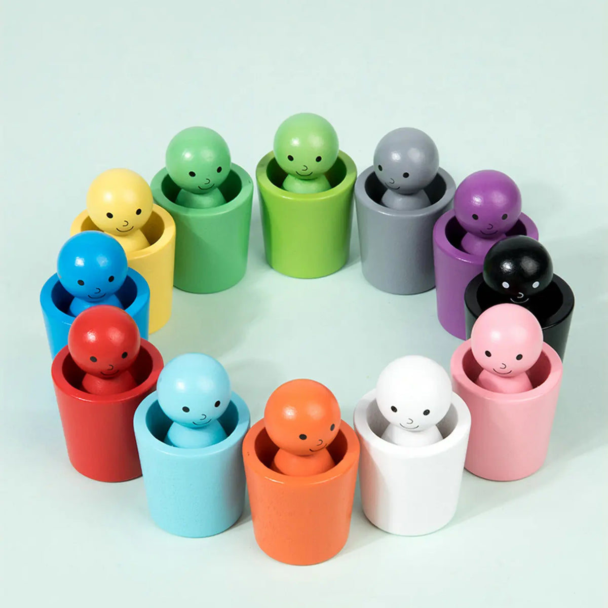 Montessori toys: dolls and colorful shapes