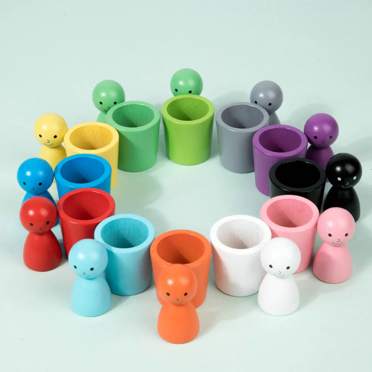 Montessori toys: dolls and colorful shapes